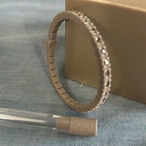 OPS silicone tennis bracelet gray with Swarovski crystals. New in original case